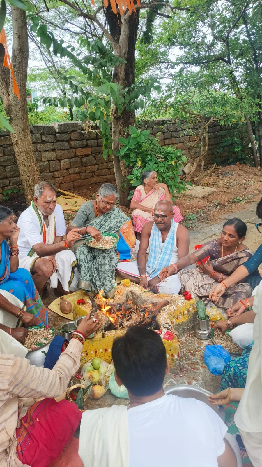 Devotees performing a homam at the temple